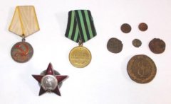 Чернівецькому обласному краєзнавчому музею СБУ передало старовинні монети та нагороди часів Радянського Союзу